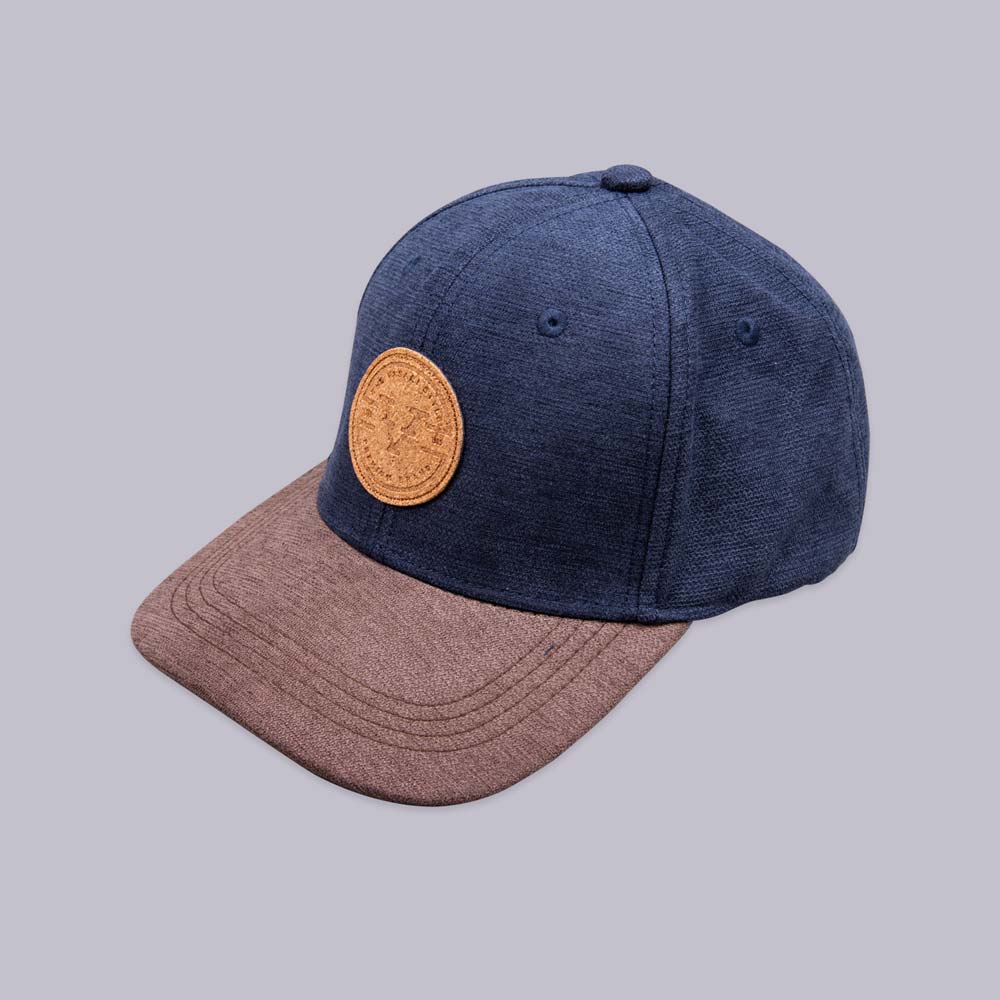 GORRA PLANA AZUL CON VICERA CAFÉ JASPE - AKÍ